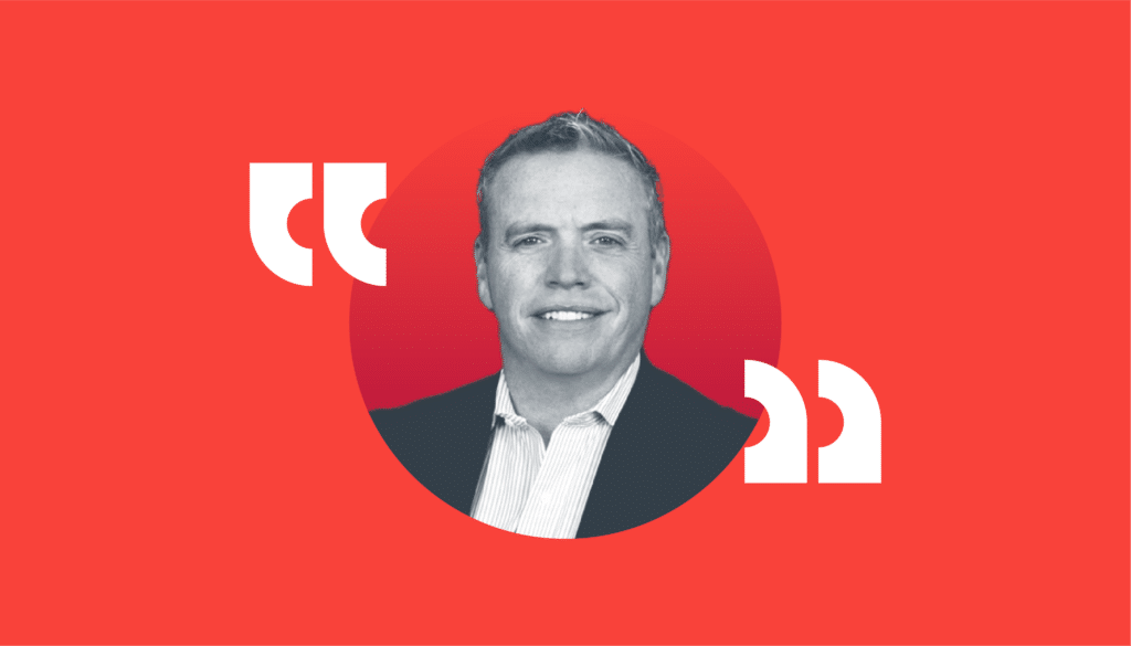 John Gresham headshot on red background
