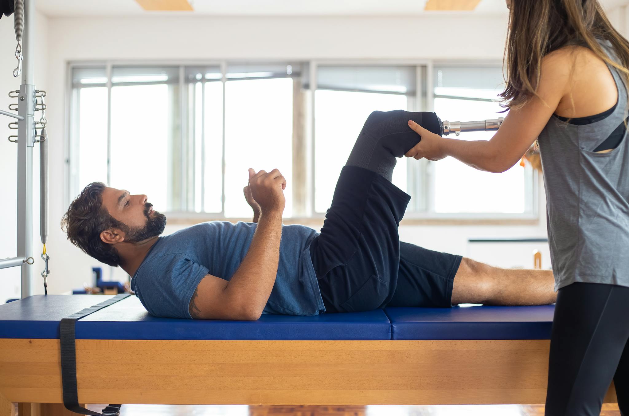 a man undergoes physical therapy for amputated leg