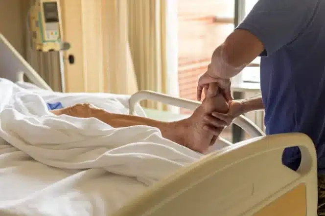 man does physical therapy for foot drop