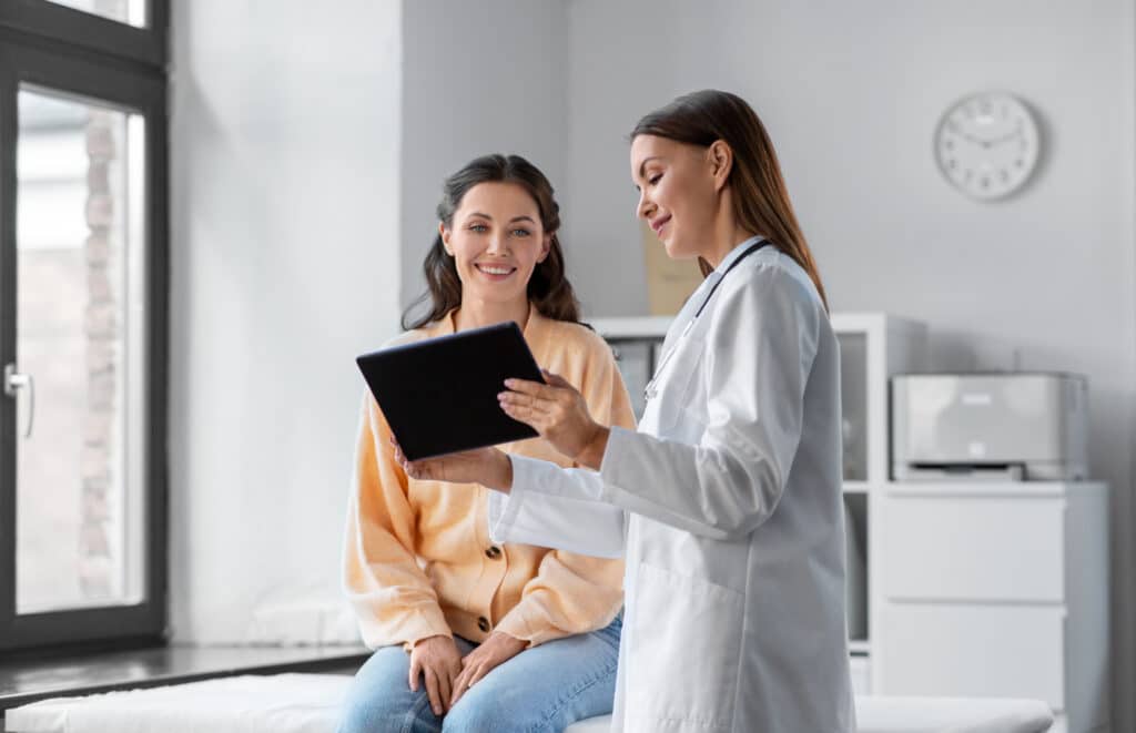 doctor helps patient understands wound healing nutrients