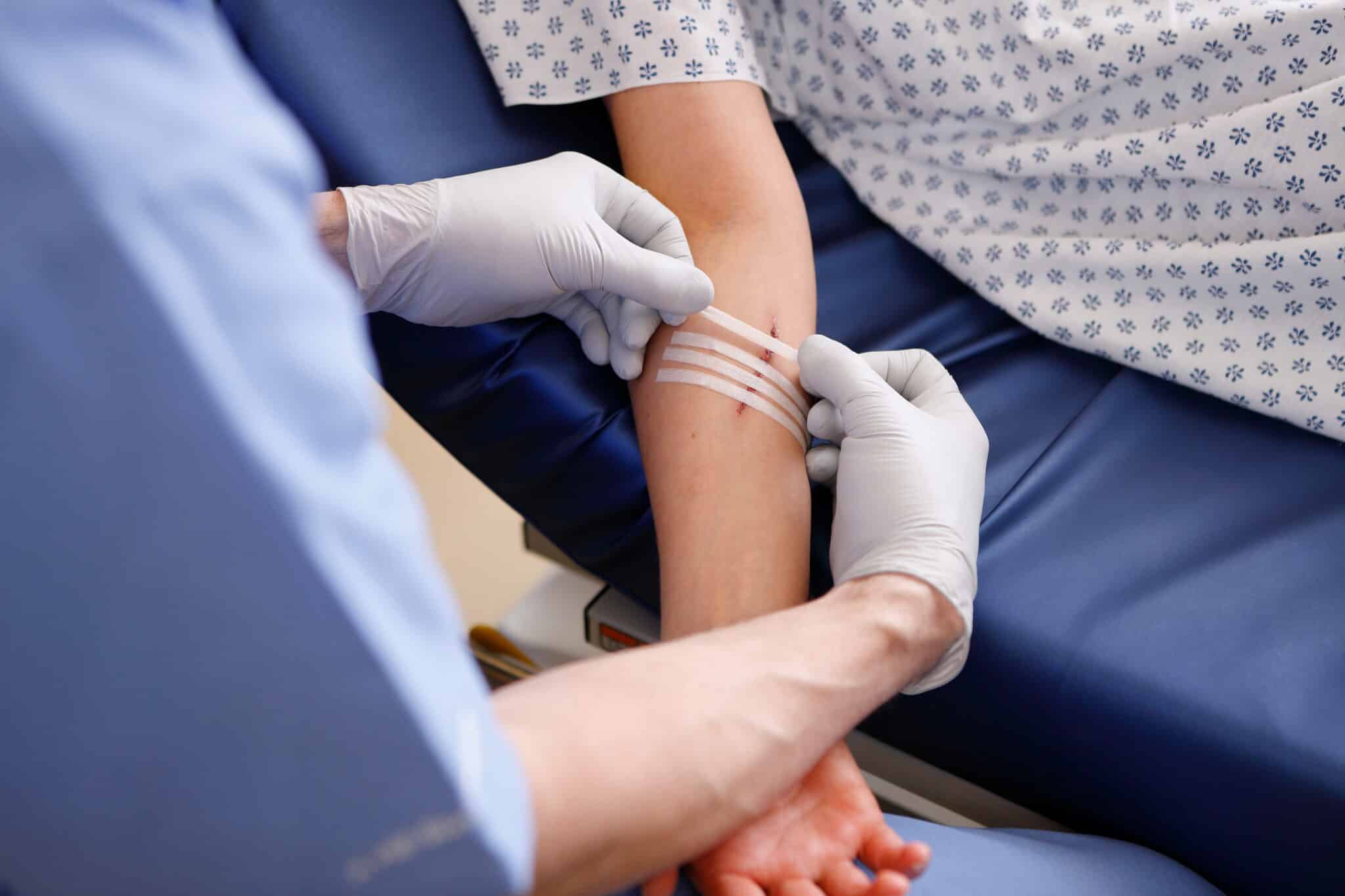 wound care nurse cares for a patient amid nursing shortage